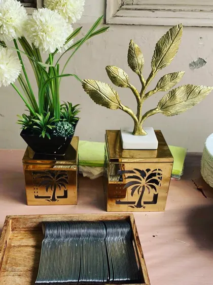 A close-up of the elegant gold-leaf decor pieces we use to adorn our buffet tables.