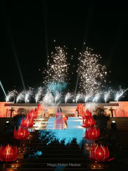 The bride's entrance is made spectacular with fireworks and illuminated lotus flowers.