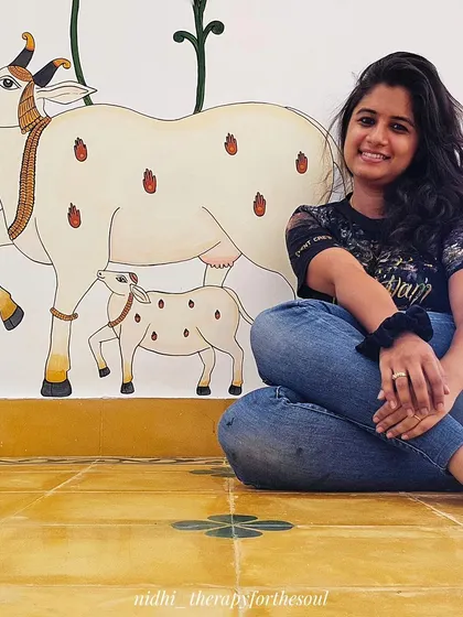 Here I am, sitting with the finished cow and calf. I was so happy when the client said it looked as clean as a decal; that was exactly the polished finish I was aiming for.