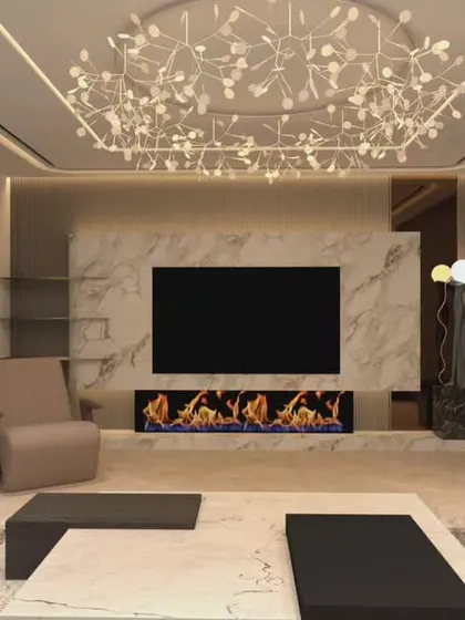A perfect setting for a cozy evening in. The electric fireplace set within a marble feature wall creates a warm focal point, complemented by the dramatic chandelier. This living room is designed to be both chic and incredibly comfortable.
