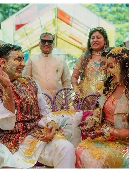 The happy aftermath of a flower and turmeric-filled celebration.