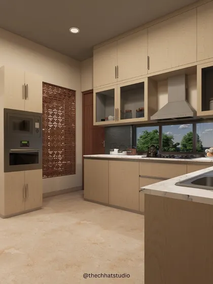 Another view of this functional kitchen, showing the integrated oven and microwave tower. This layout ensures an ergonomic workflow, keeping essential appliances easily accessible while maintaining a clean, uncluttered look.
