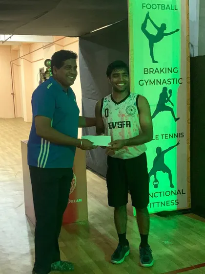 Coach Rohit receiving his award, a testament to his skill, discipline, and passion for the game.