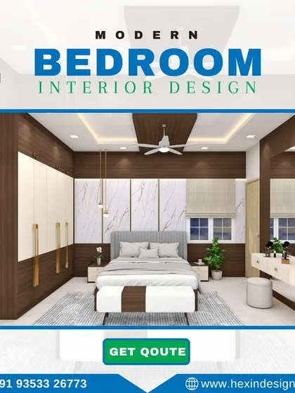 This modern bedroom design focuses on clean lines and a neutral color palette. The wardrobe features a dual-tone finish, and the false ceiling incorporates both recessed and pendant lights for varied lighting options.