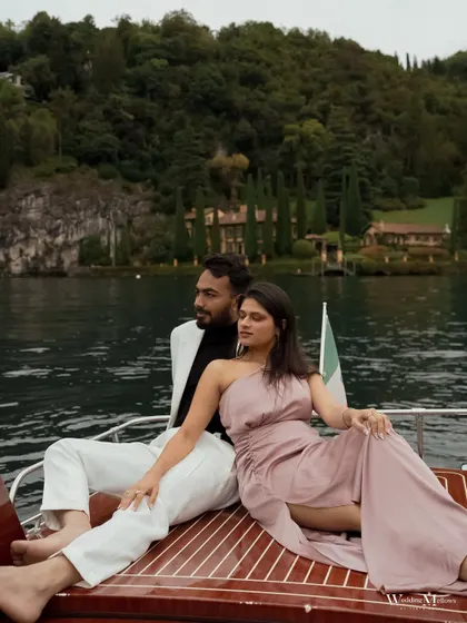 A stylish portrait of Nisarg and Mansi on a boat in Lake Como. We love incorporating elements of luxury and adventure, like a private boat ride, to make your destination shoot an unforgettable experience.