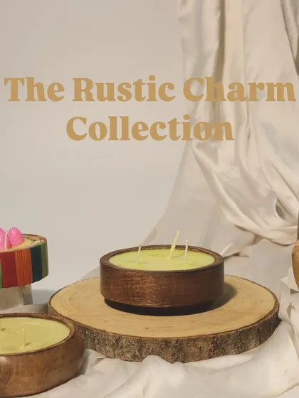 Earthy, elegant, and giftable. This image showcases our Rustic Charm Collection, featuring a variety of our hand-poured candles in beautiful, natural wooden bowls and containers.