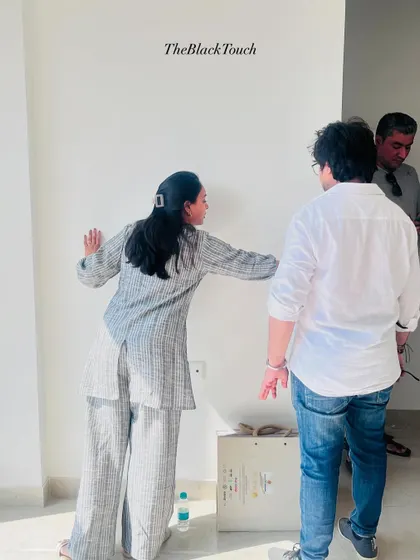 Our team marking up walls and planning layouts directly on-site. This hands-on approach helps visualize the space and confirm placements.