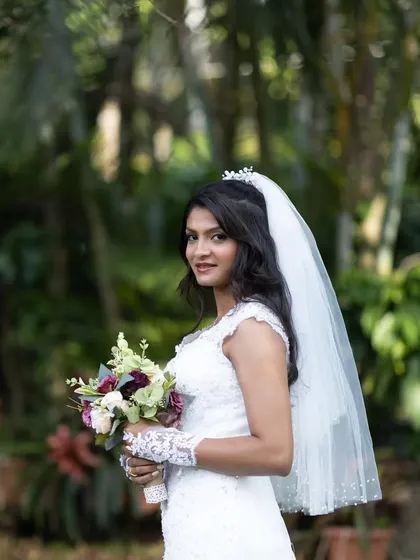 A close-up of my beautiful bride Wilsy in her custom mermaid gown. The delicate lace on the cap sleeves and the elegant tiara complete her timeless yet modern bridal look.