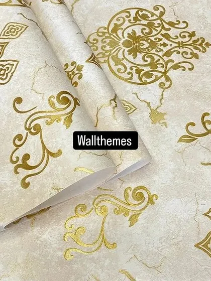 A cream-colored wallpaper roll with a classic gold damask design, perfect for a light and elegant room.