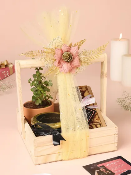 Another one of my elegant Diwali hampers, decorated with a beautiful flower and filled with delicious treats.