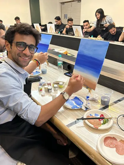 A smiling participant, happy with his progress and the friendly environment.