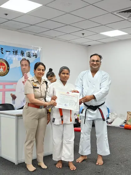This young girl's smile says it all as she receives her new belt. These moments build a deep sense of accomplishment and motivate students to continue their training.