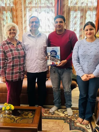 Our team with a family in their home, discussing the benefits of their new solar plan. We take the time to ensure our customers are fully informed and comfortable.