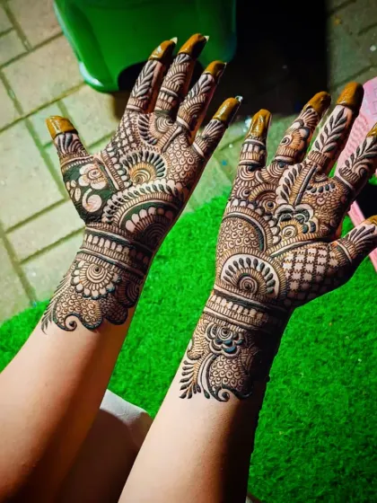 Another angle of the same intricate design, highlighting the beautiful wrist cuff.