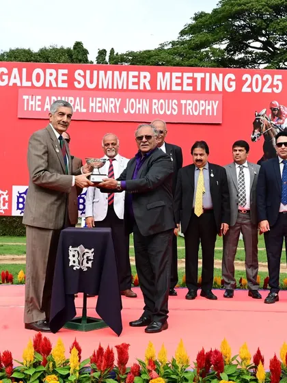 Mr. P.G. Belliappa presents The Admiral Henry John Rous Trophy to the winning connections of Power of Beauty.