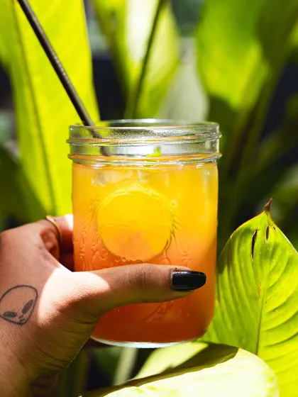 A close-up of our orange mocktail, showing its beautiful color.