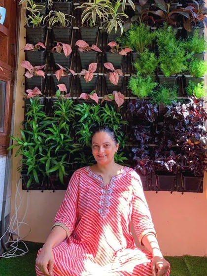 There's nothing better than seeing a happy client enjoy their new space. I created this compact living wall for a balcony, making a perfect little zen zone for morning tea or yoga. This is what "small space, big makeover" is all about.