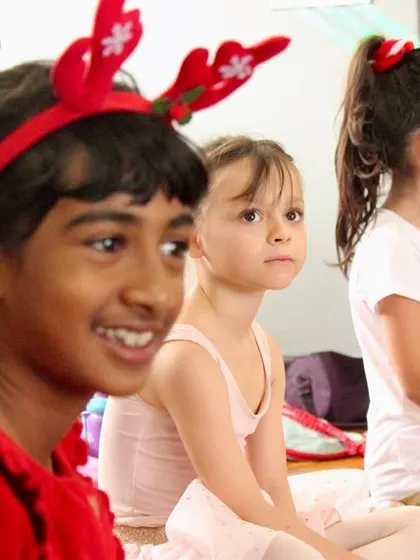 Christmas magic at the studio. Our little dancers, dressed in festive reindeer antlers and red outfits, are all smiles during our winter classes.