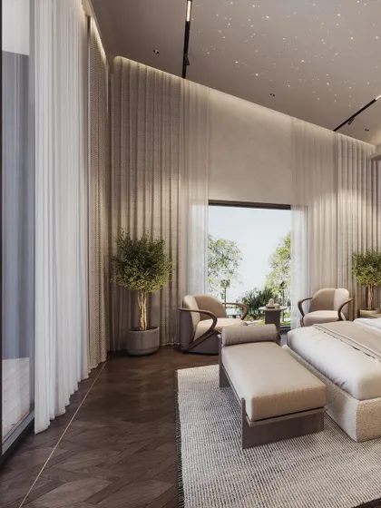 A wide shot showing the double-height curtains and the seating area by the window, creating a sense of grandeur and connection to the outdoors.