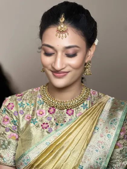 A close-up with eyes closed to show the soft, shimmery eyeshadow. You'll learn how to create this kind of elegant, understated eye look that is perfect for any occasion.
