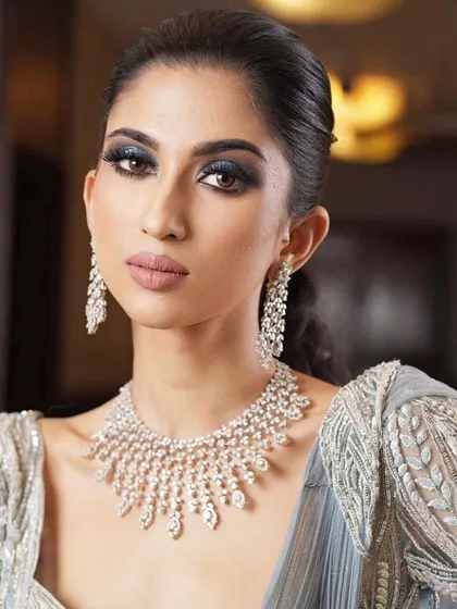 A classic smokey eye and nude lip on a model with beautiful dusky skin. My courses emphasize working on all skin tones, teaching you the right techniques and products for every complexion.