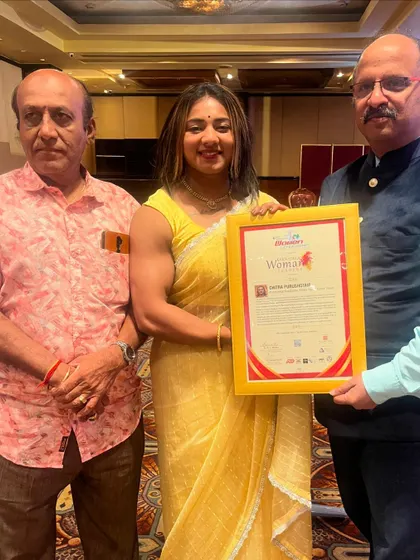 Receiving my award, with my father by my side. This was a truly special moment in my career.
