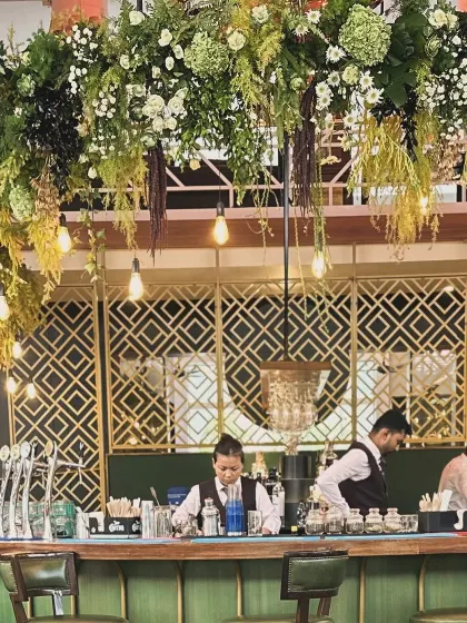 We gave the bar a fresh new look for the Karnataka Golf Association's 50th-anniversary celebration, with a massive hanging floral installation that added drama and sophistication.