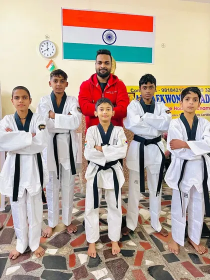 My team of black belts standing proud under the Indian flag. This is what we represent, and this is who we fight for.