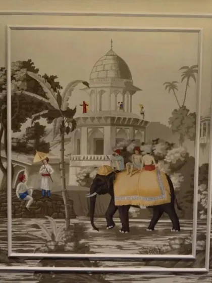 Here, a classic Indian heritage scene is elegantly framed by wall molding. This technique turns the wallpaper into a custom piece of art, adding a layer of architectural detail and sophistication.