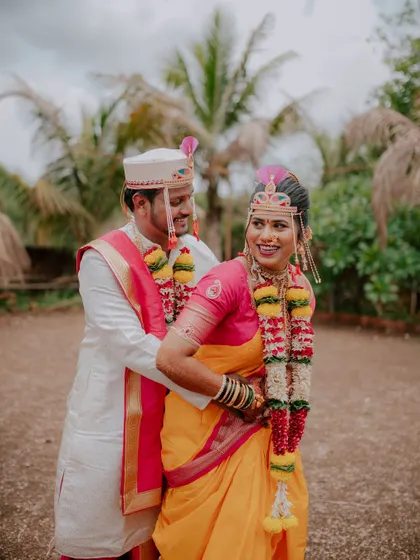 A playful and happy moment between the newly married couple.