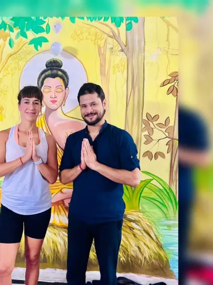 A cropped version of my photo with a visiting yogi. The connection we build on the mat is a special one, and I am grateful for every student who walks through my door.
