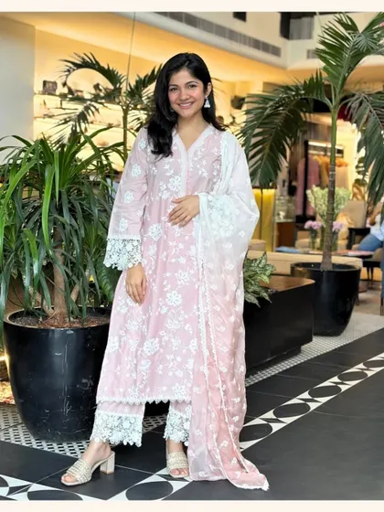 Another one of my classic pink kurta sets. This one features a beautiful floral print with delicate lace on the sleeves and pants for a coordinated look.