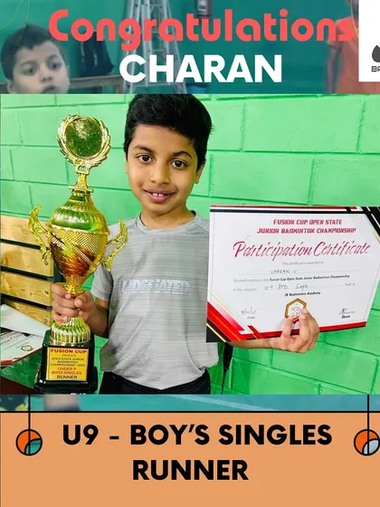 Charan with his runner-up trophy in the Under-9 Boy's Singles. Consistent podium finishes are a sign of a true competitor.