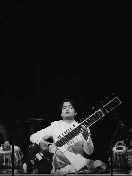 The rhythmic foundation of my band. Here you see me with two incredible tabla players, creating intricate patterns that drive our performances. This setup is ideal for audiences who appreciate the nuances of Indian percussion.