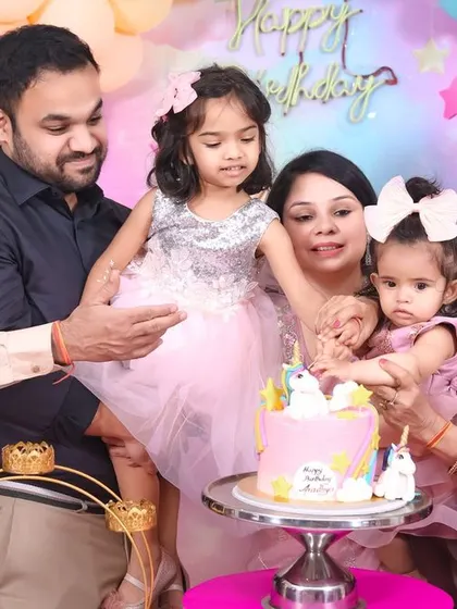 A magical 'Frozen 2' themed birthday party, transforming the venue into an enchanted forest with earthy tones, character cutouts, and shimmering backdrops.