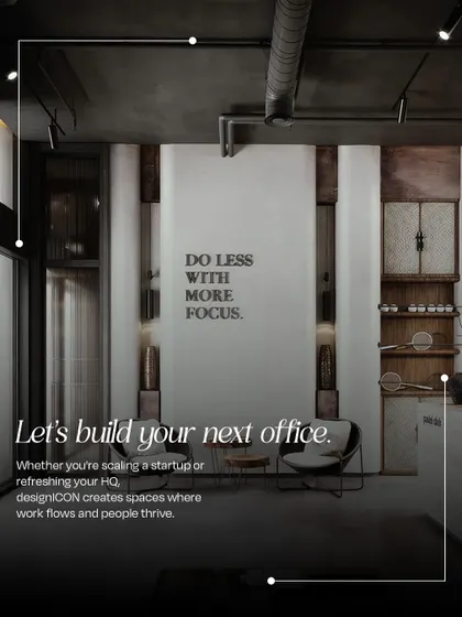 A minimalist office nook with the motivational phrase 'Do Less With More Focus' on the wall. This image represents our philosophy of creating intentional spaces that help people thrive and work flows naturally.