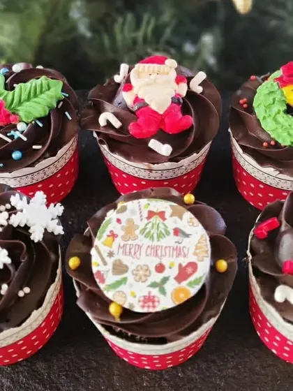 Our Christmas-themed chocolate cupcakes are decorated with festive toppers like Santa, wreaths, and snowflakes, adding a touch of holiday magic to your dessert table.