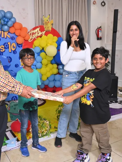 I help manage the entire flow of the party, including special moments like gift giving. My goal is to make sure everything runs smoothly so the family can relax and enjoy the celebration.