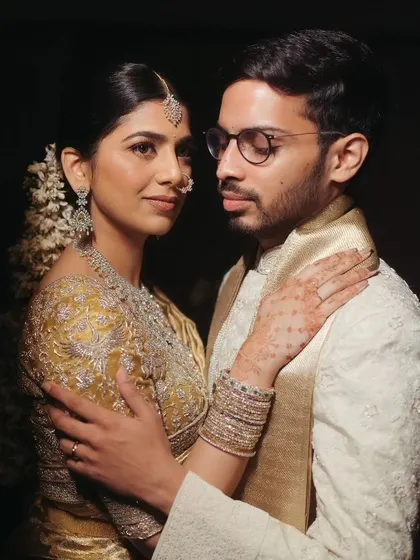 An intimate portrait of the couple, capturing their deep connection and the elegance of their wedding attire.
