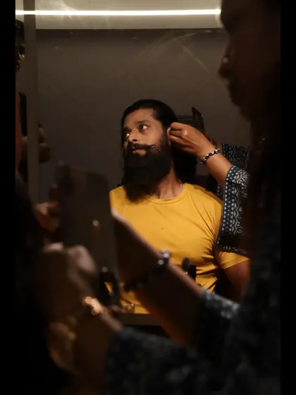 A behind-the-scenes look at the preparation for the Chhatrapati Shivaji Maharaj shoot. Capturing the process, like hair and makeup, is part of telling the complete story.