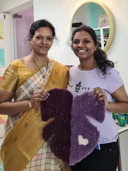 This mother and daughter created a picture-perfect heart rug that fits together. It's a beautiful symbol of the connection they shared during their workshop session.