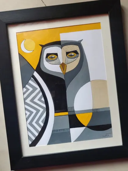 This geometric owl was painted with acrylics, blending sharp lines and patterns with a modern color palette of yellow, grey, and black. It's a piece that helped me break an art block and resulted in a striking, contemporary artwork.