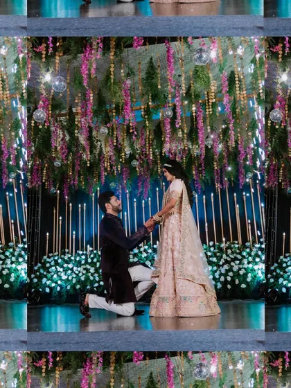 A romantic shot of the groom proposing to the bride on stage during their Sangeet or engagement.