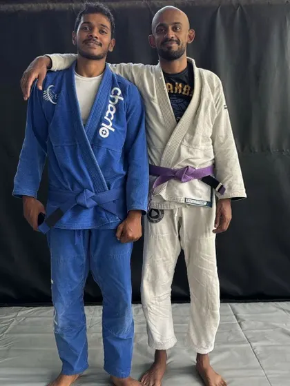 Another shot with a respected coach and training partner. The BJJ community is built on mutual respect and shared knowledge.