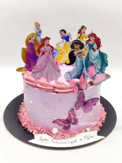 A simple Disney Princess theme cake with a focus on pink and purple hues. The addition of edible butterflies adds a touch of delicate charm.
