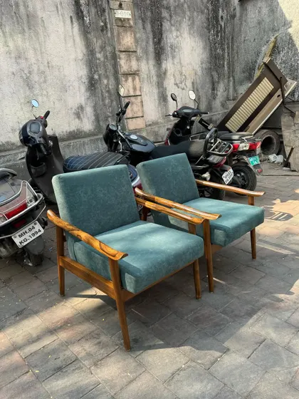 A high-angle view of the pair of chairs.
