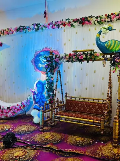 Creating a magical dreamscape for your baby shower is my passion. This setup combines a beautiful floral crescent moon with a traditional swing and a majestic peacock, all set against an elegant backdrop to make your celebration unforgettable. 💖