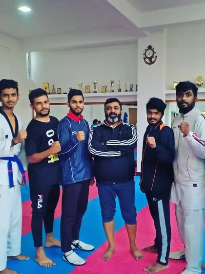 Posing together after a team training session. This is our group of dedicated athletes who push each other to be better every day.
