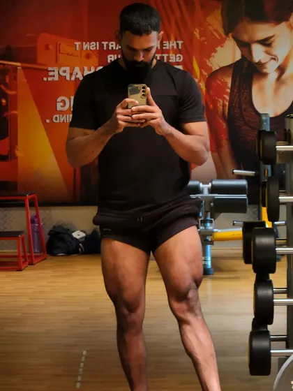 Strong legs are the foundation for everything. This is the result of countless squats, deadlifts, and plyometric exercises. I focus on building powerful quadriceps and hamstrings for both performance and aesthetics.