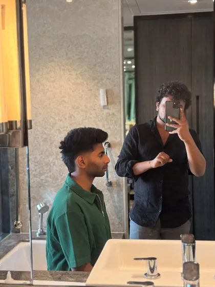 Side profile of Mayank Yadav's haircut.
